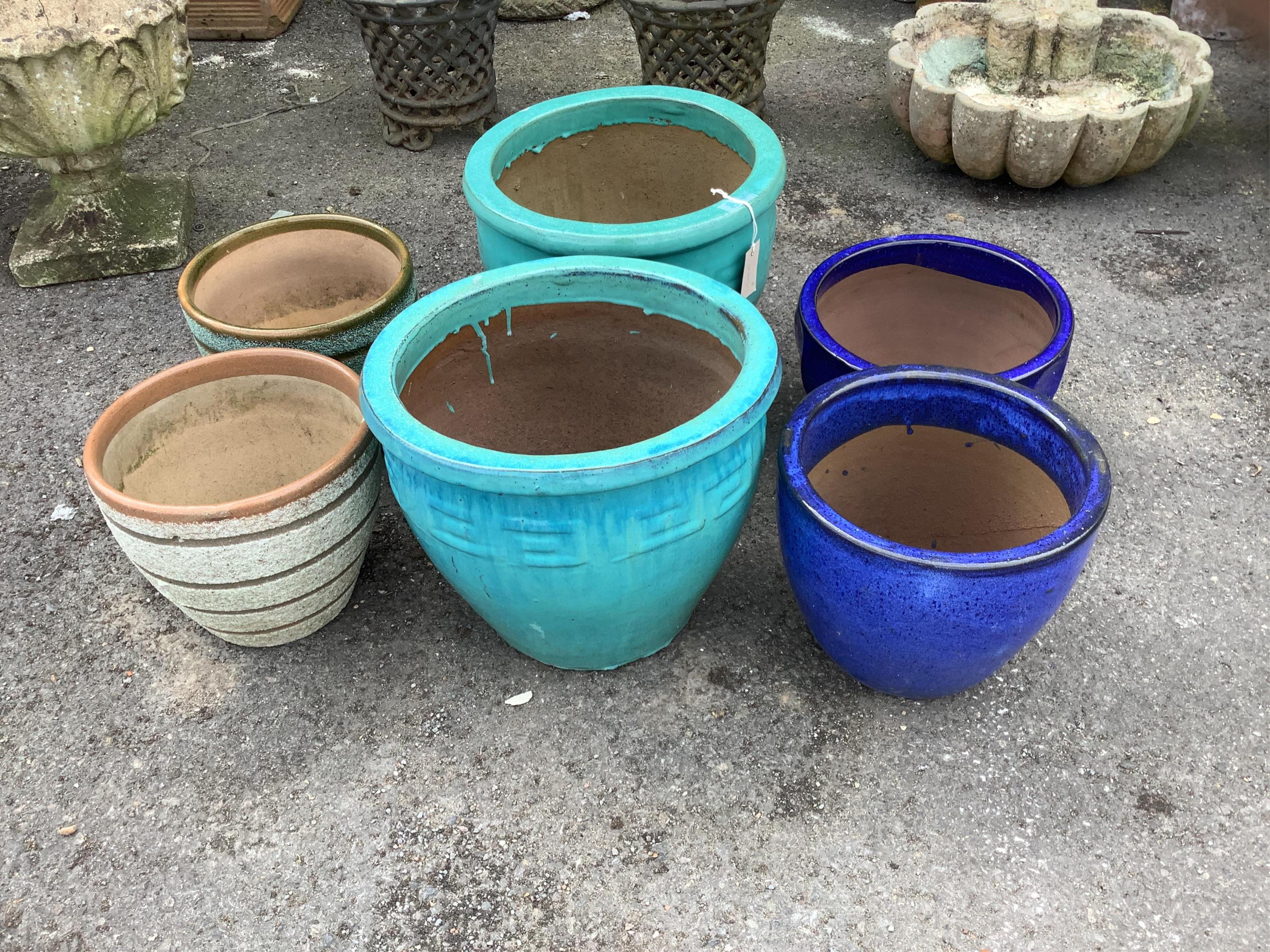 Six (three pairs) circular glazed earthenware garden planters, largest diameter 38cm, height 32cm. Condition - good